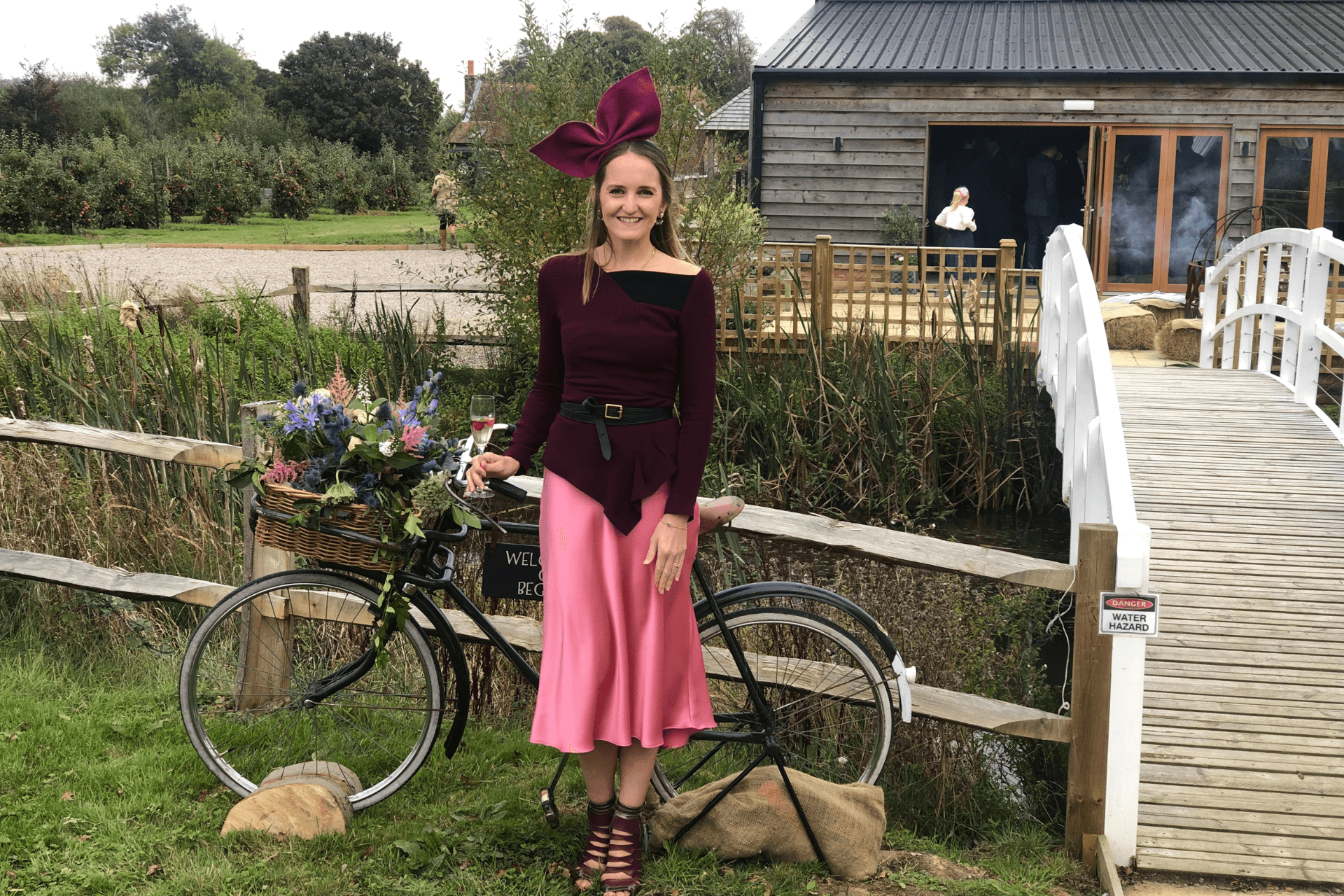 image of Kara Hackett social media manager dressed in a fashionable outfit with a stylish hat