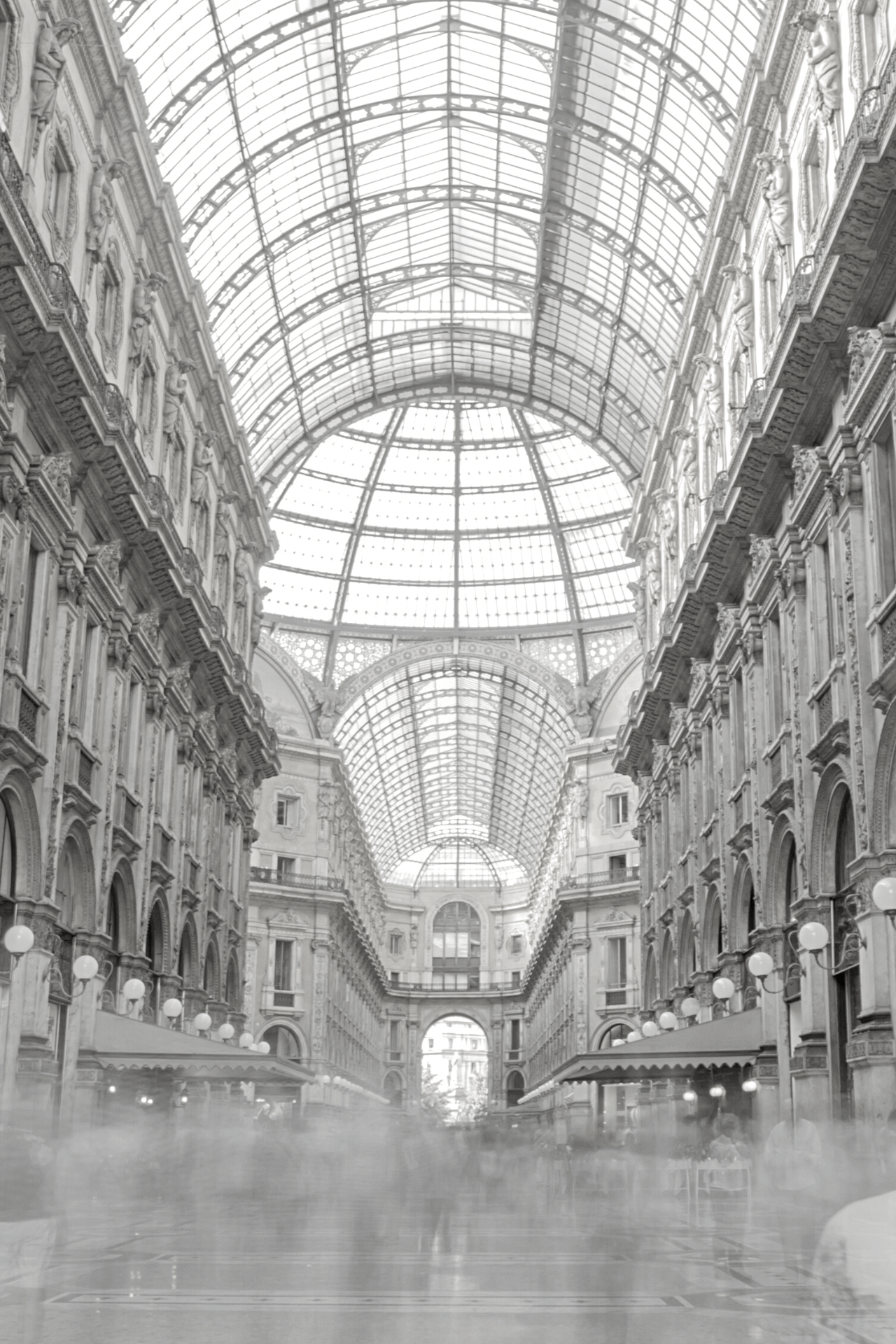 Image of the inside of a luxury shopping mall in Milan and the glass ceiling